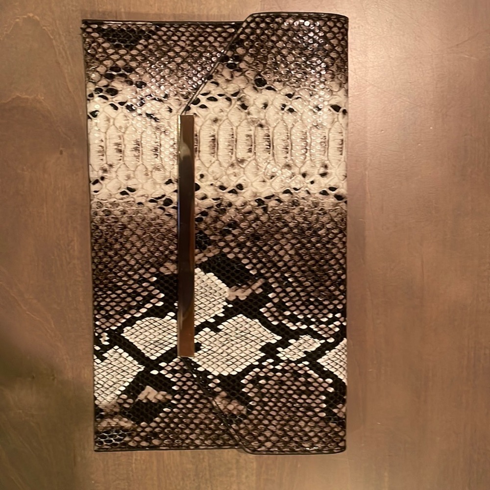 Snake skin clutch